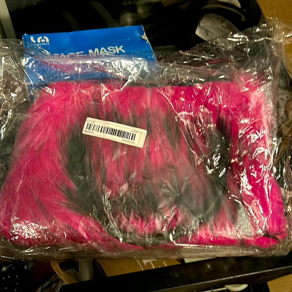 Pink and black furry purse